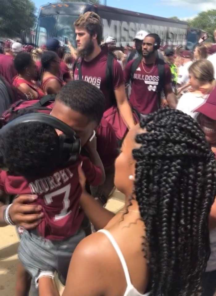 Marcus Murphy greets son, Mason, during a Dawg Walk last season. (Photo submitted by Alicia Cherry)
